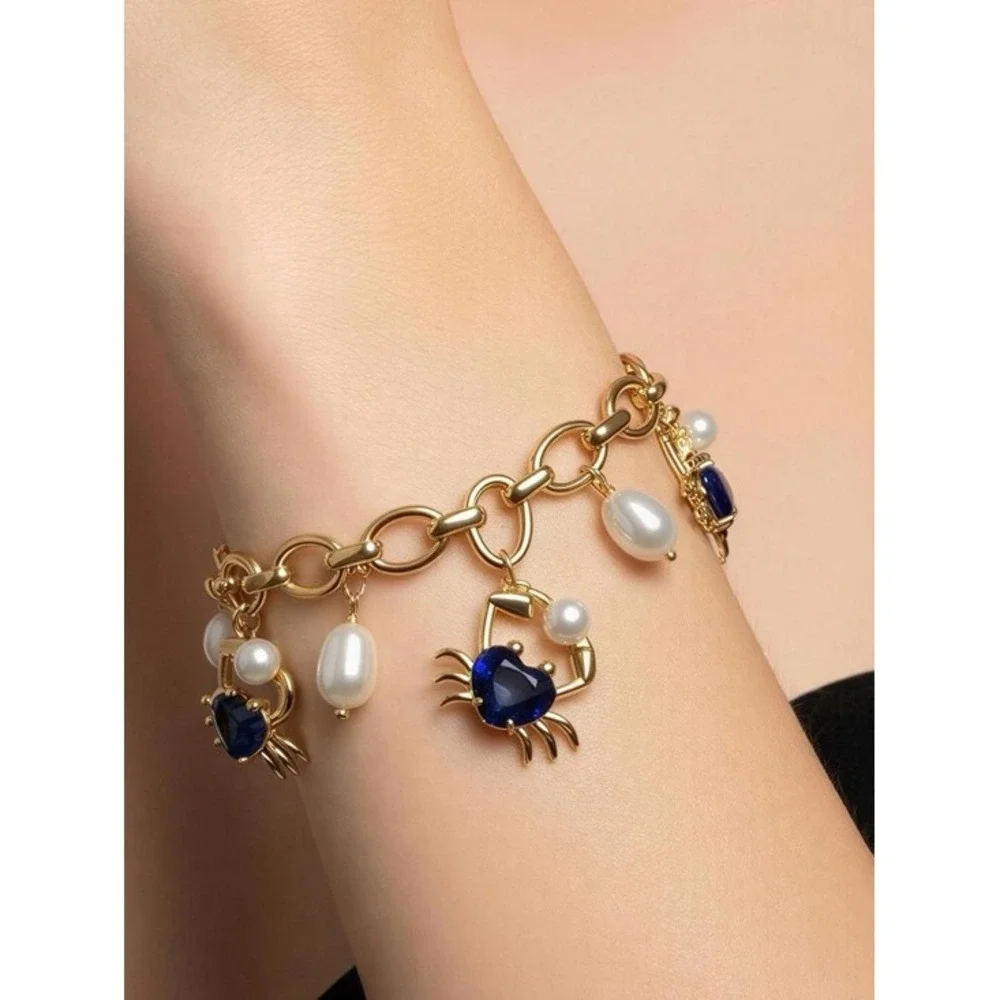 Kate‎ Spade claw out Gold Chain Bracelet with Blue Crystal & Pearl Charm